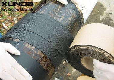 China Geotextile Backed Self Adhesive Bitumen Tape , Protective Pipeline Coating Bituminous Tape supplier